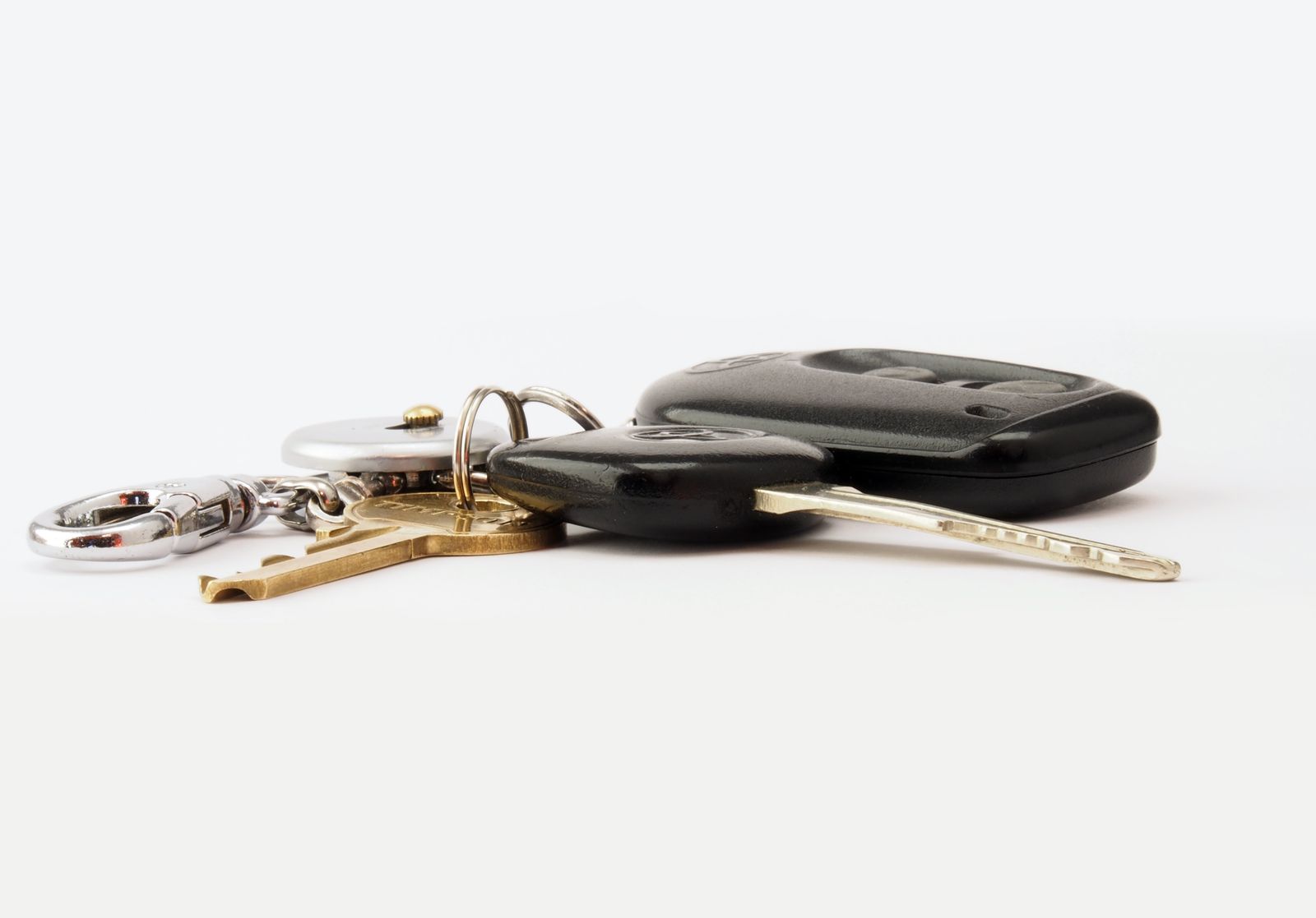 A new set of house keys handed over on move-in day, representing a Central Alberta home buyer's guide from REALTOR Carrie Meir