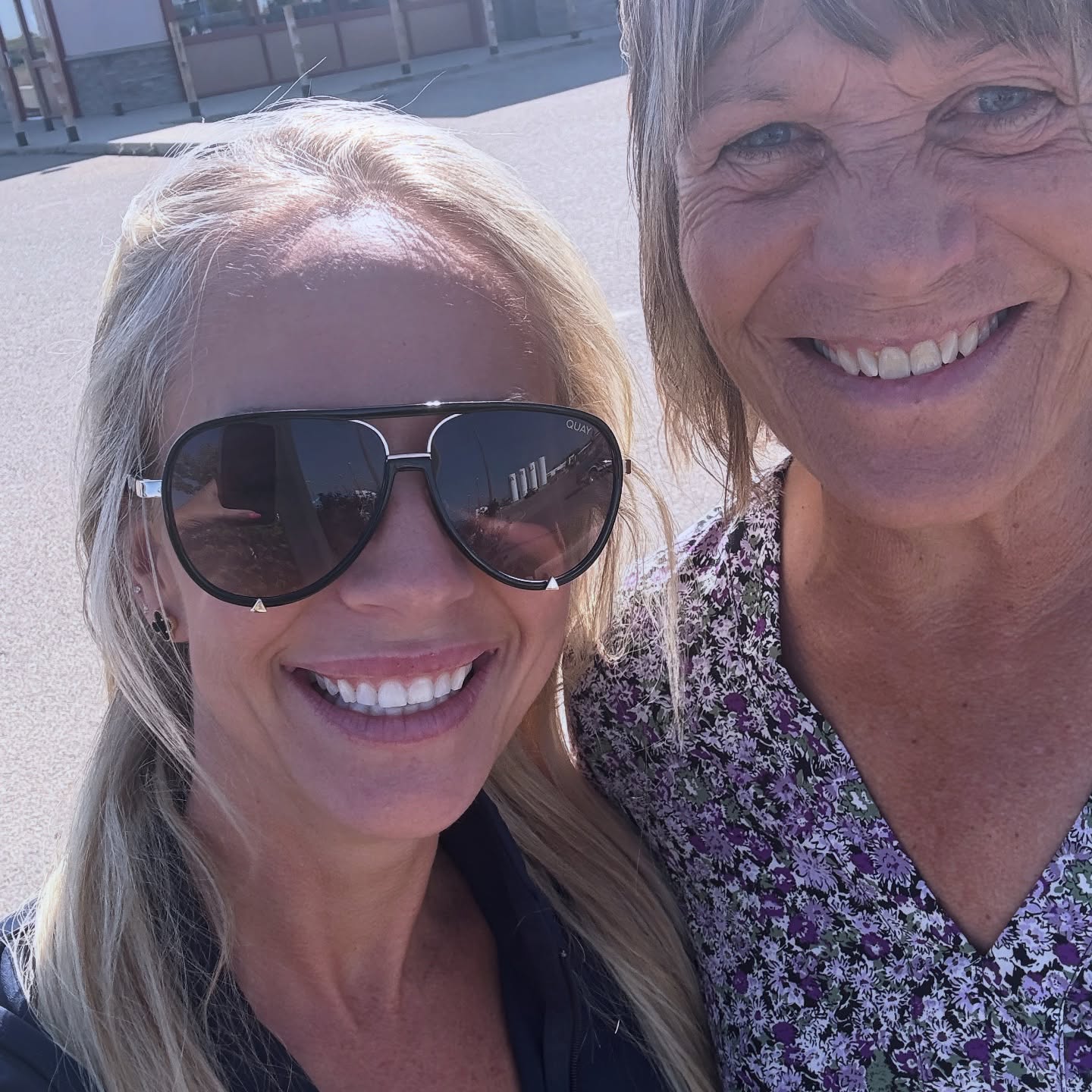 Red Deer REALTOR Carrie Meir smiling with a senior client